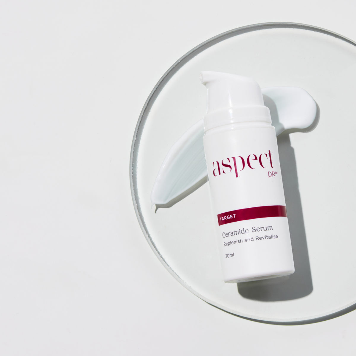 Aspect DR Ceramide Serum 30ml with lid removed and serum dispensed, showing lightweight texture and hydrating formula for skin rejuvenation.