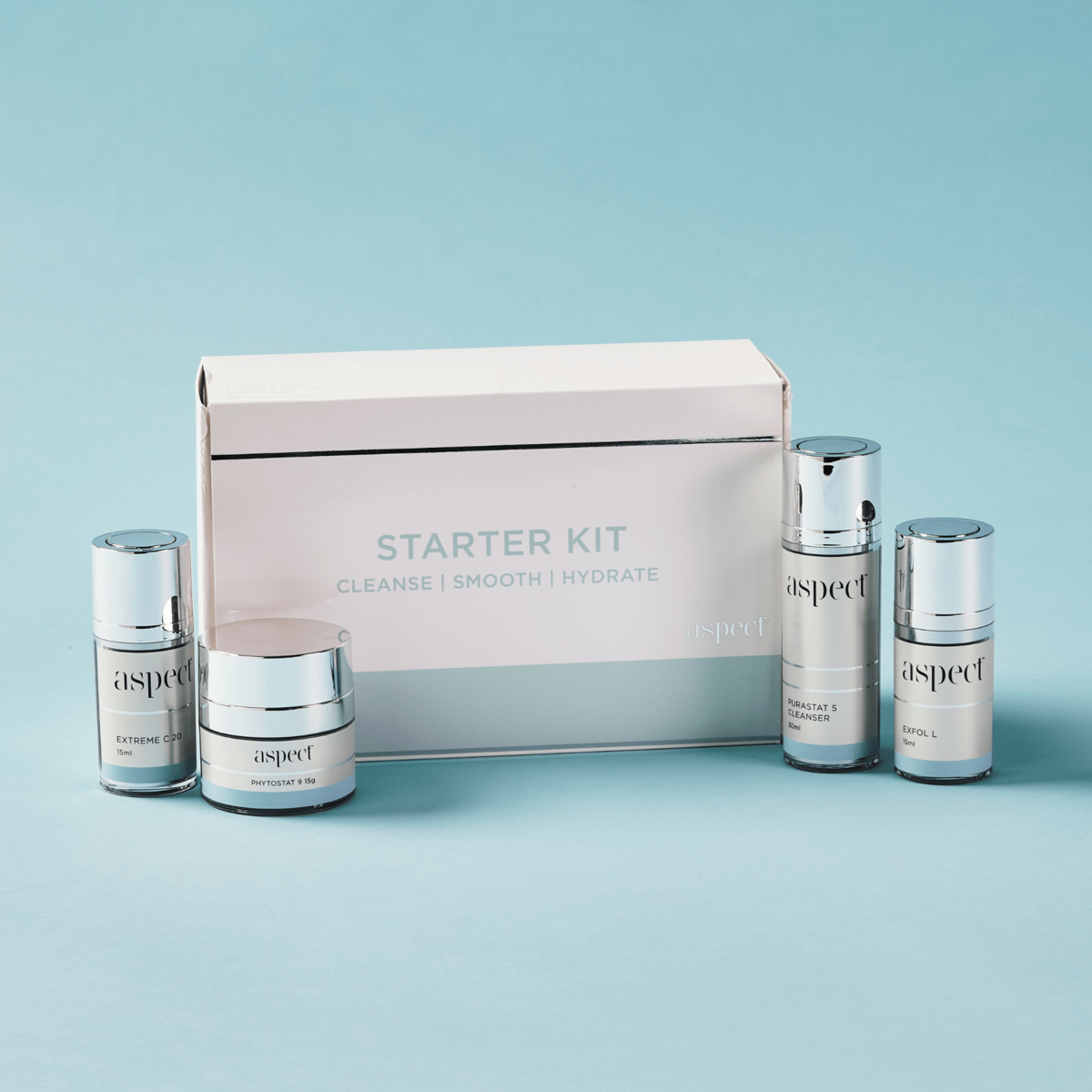 Styled photo of the Aspect Starter Kit with Purastat 5, Extreme C 20, Exfol L and Phytostat 9 arranged in front of the branded box.
