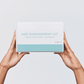Aspect Age Management Kit box held in two hands, showcasing the full anti-ageing skincare system with cleanser, vitamin C serum, retinol and moisturiser.