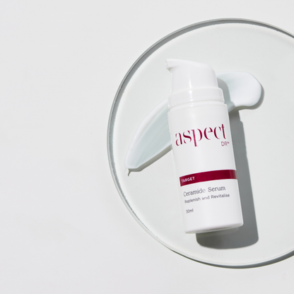 Aspect DR Ceramide Serum 30ml with lid removed and serum dispensed, showing lightweight texture and hydrating formula for skin rejuvenation.