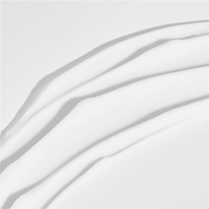 Close-up smear of Aspect Restorative 8 Night Cream, showing the rich, creamy texture that deeply nourishes and softens the skin.