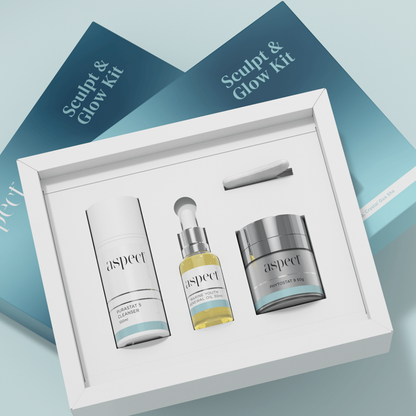 Opened Aspect Sculpt & Glow Limited Edition Kit displaying Purastat 5, Marine Youth Renewal Oil and Phytostat 9 in their packaging for a complete glow-enhancing skincare routine.