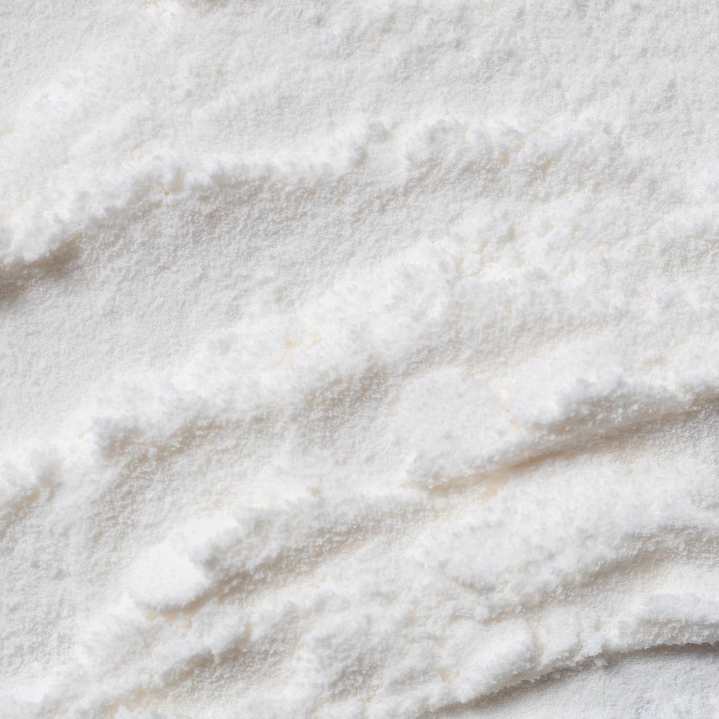 Cosmedix B Complex Vitamin B Boosting Powder texture for customised vitamin B skincare and stronger barrier function.
