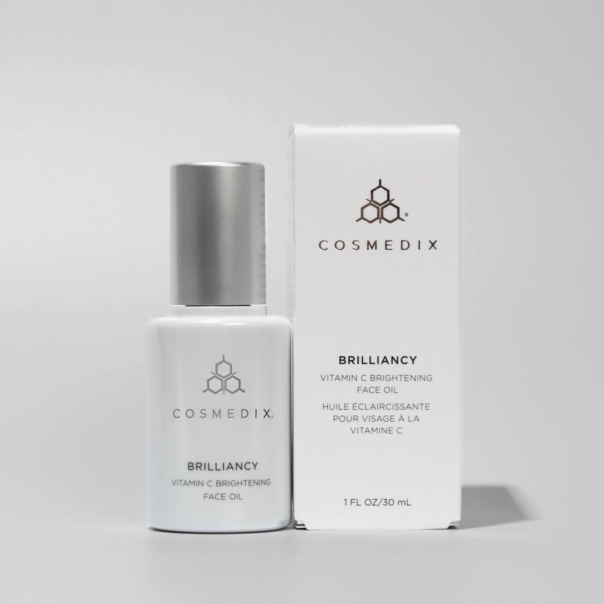 Cosmedix Brilliancy Vitamin C Brightening Face Oil with tetrahexyldecyl ascorbate for luminous, even-looking skin.