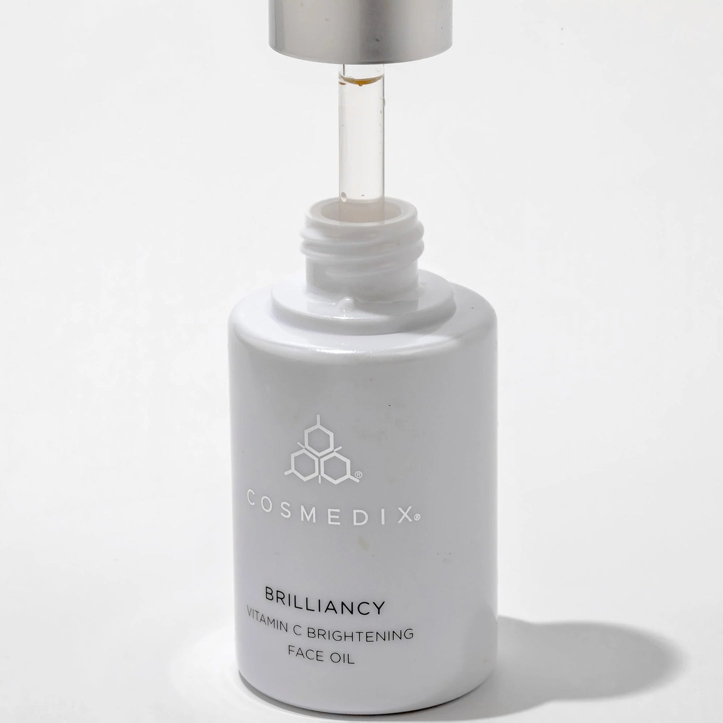 Cosmedix Brilliancy Vitamin C Brightening Face Oil with elderberry extract for dark spots and moisture depletion.
