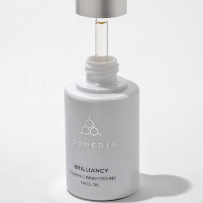 Cosmedix Brilliancy Vitamin C Brightening Face Oil with elderberry extract for dark spots and moisture depletion.