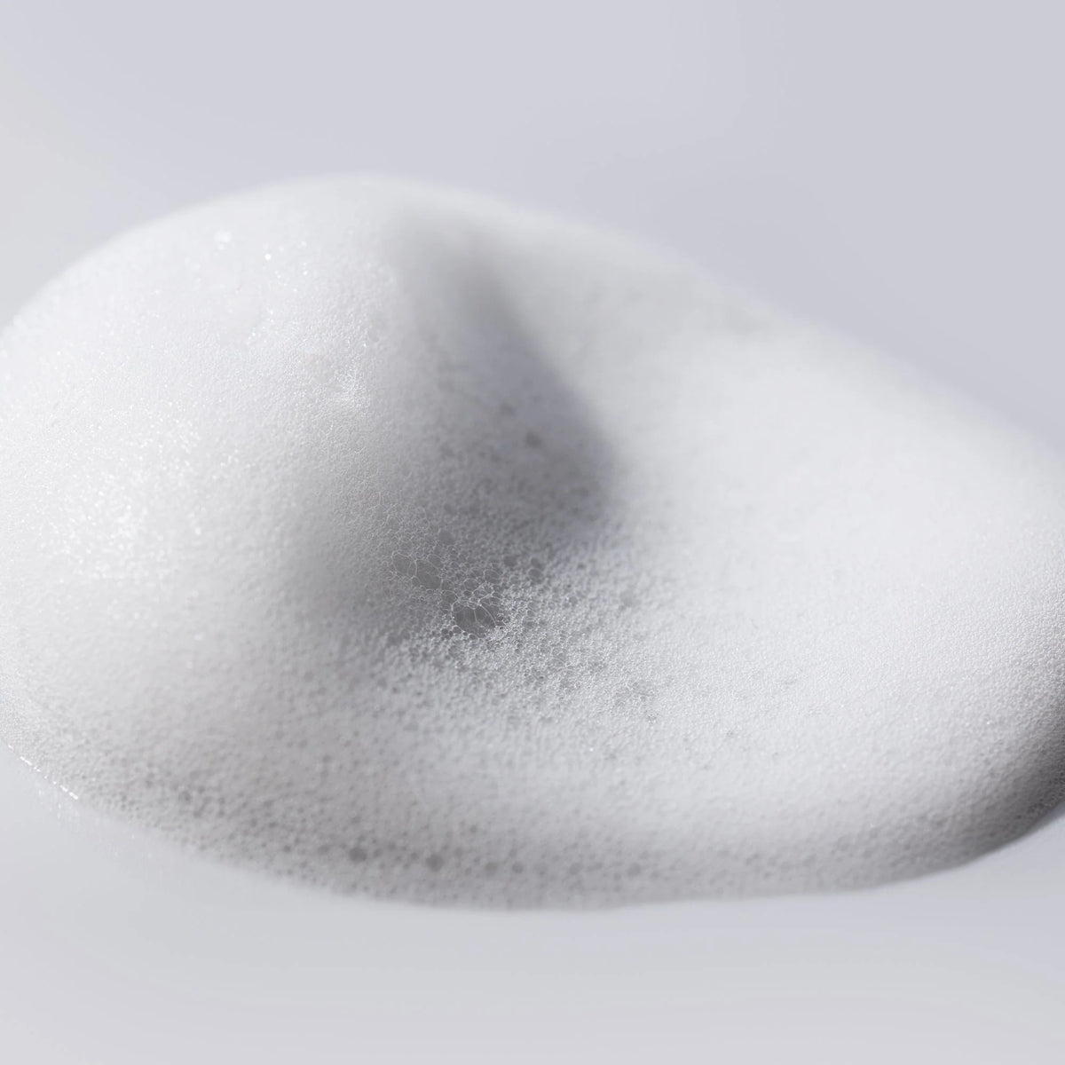 Cosmedix Clarify foaming cleanser with aloe vera and panthenol to purify congested skin without stripping moisture.
