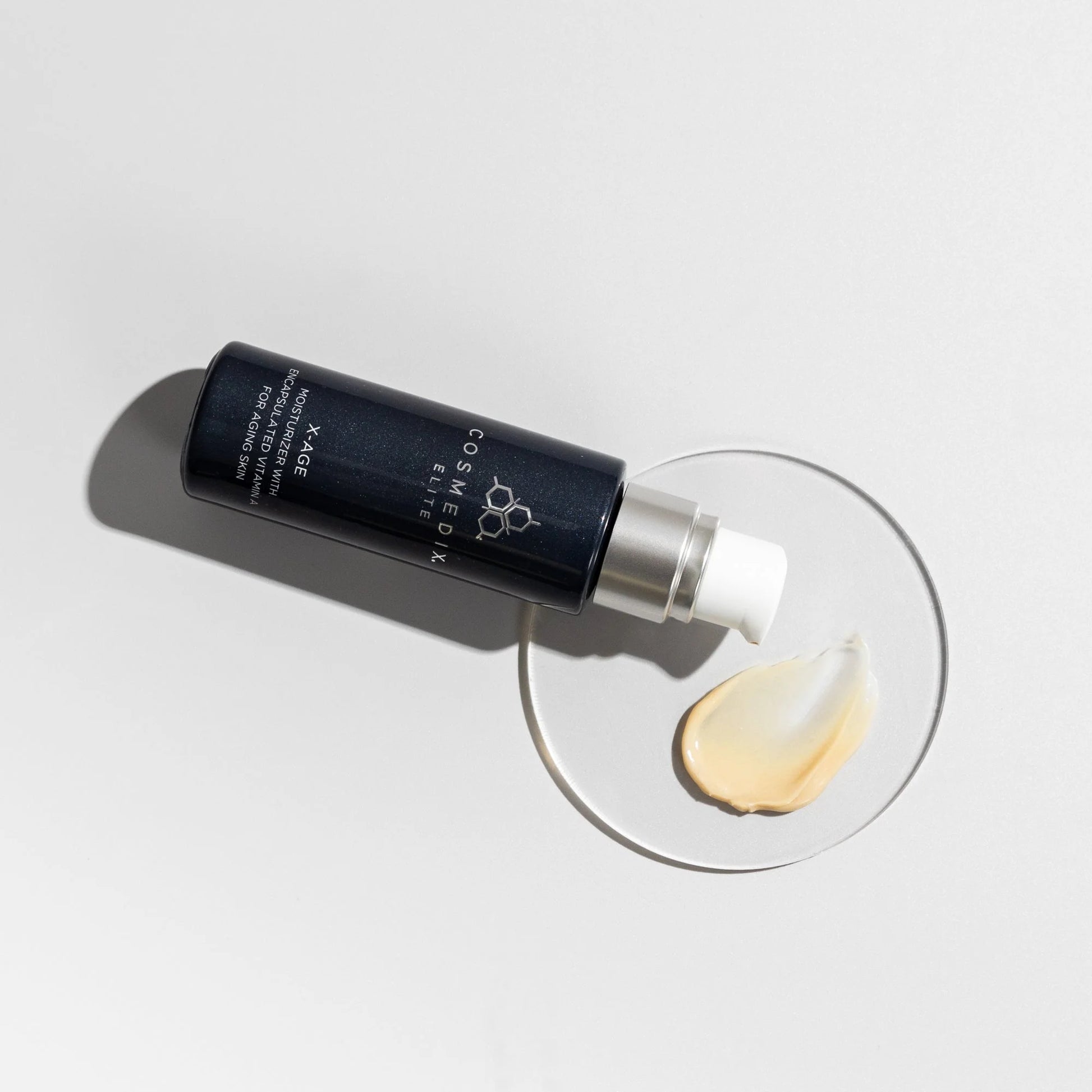 Cosmedix Elite X-Age vitamin A moisturiser with hydrating cream texture for fine lines and uneven skin tone.