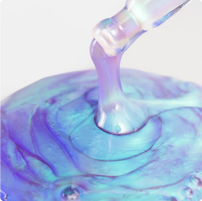 Cosmedix Opti Crystal Liquid Crystal Eye Serum iridescent texture for lasting hydration and luminous eye contours.
