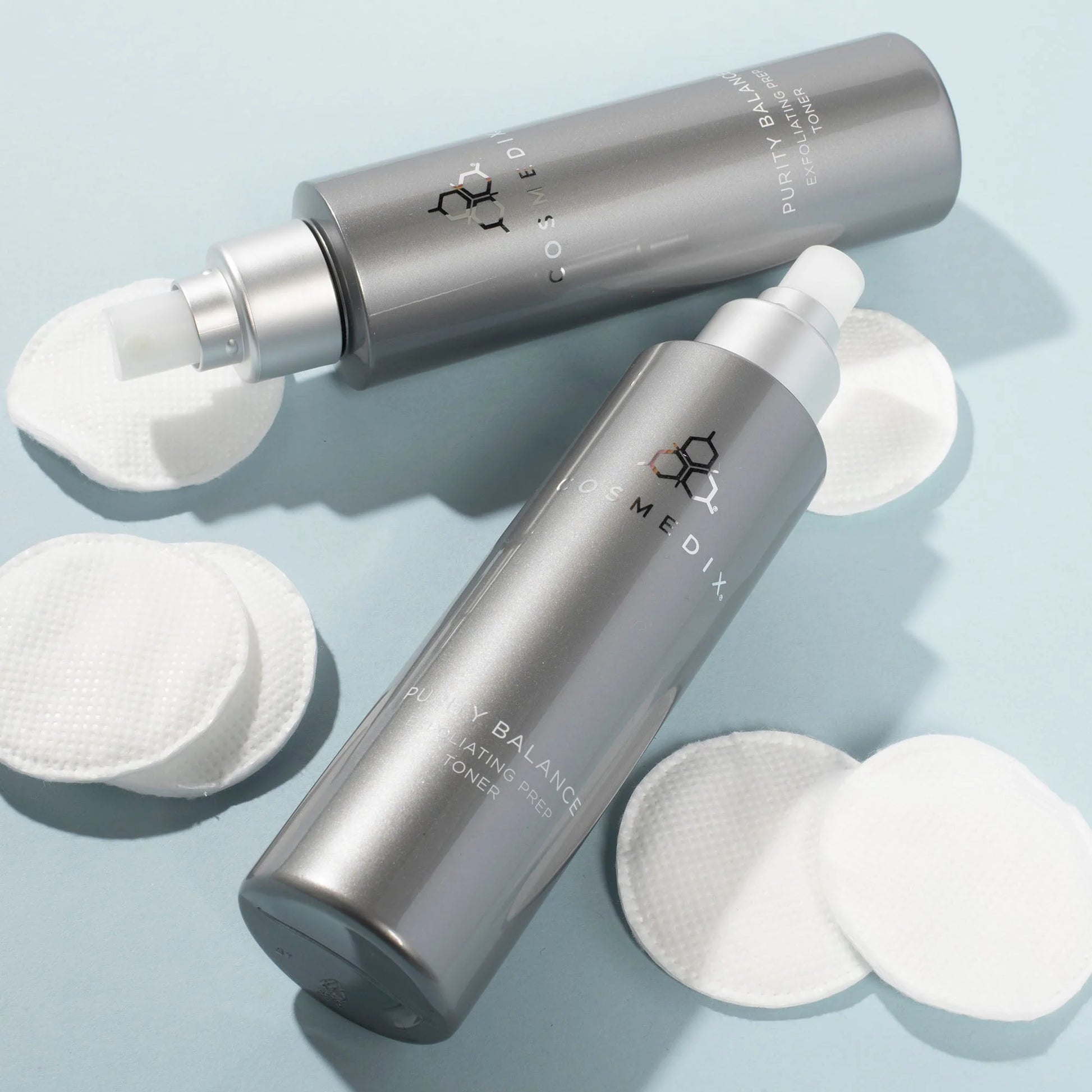 Cosmedix Purity Balance Exfoliating Prep Toner 150ml, exfoliating prep toner shown with cotton rounds for post-cleanse pore refining skincare.