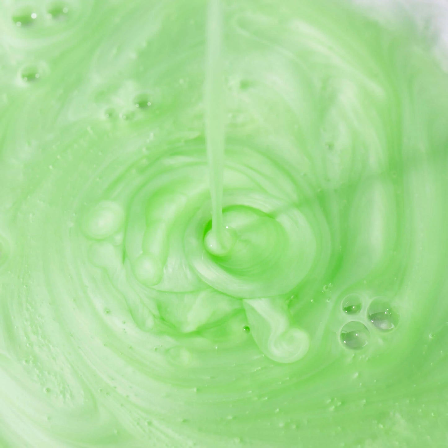 Cosmedix Purity Clean Exfoliating Cleanser refreshing green gel texture with lactic acid, tea tree oil and peppermint for smoother-looking skin.