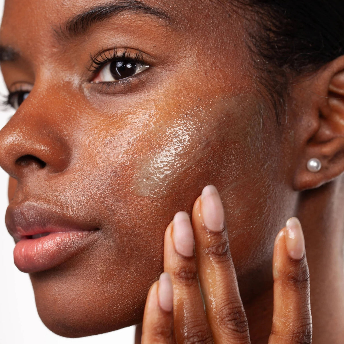 Cosmedix Purity Clean Exfoliating Cleanser clarifying gel cleanser applied to support clearer, balanced and radiant-looking skin.