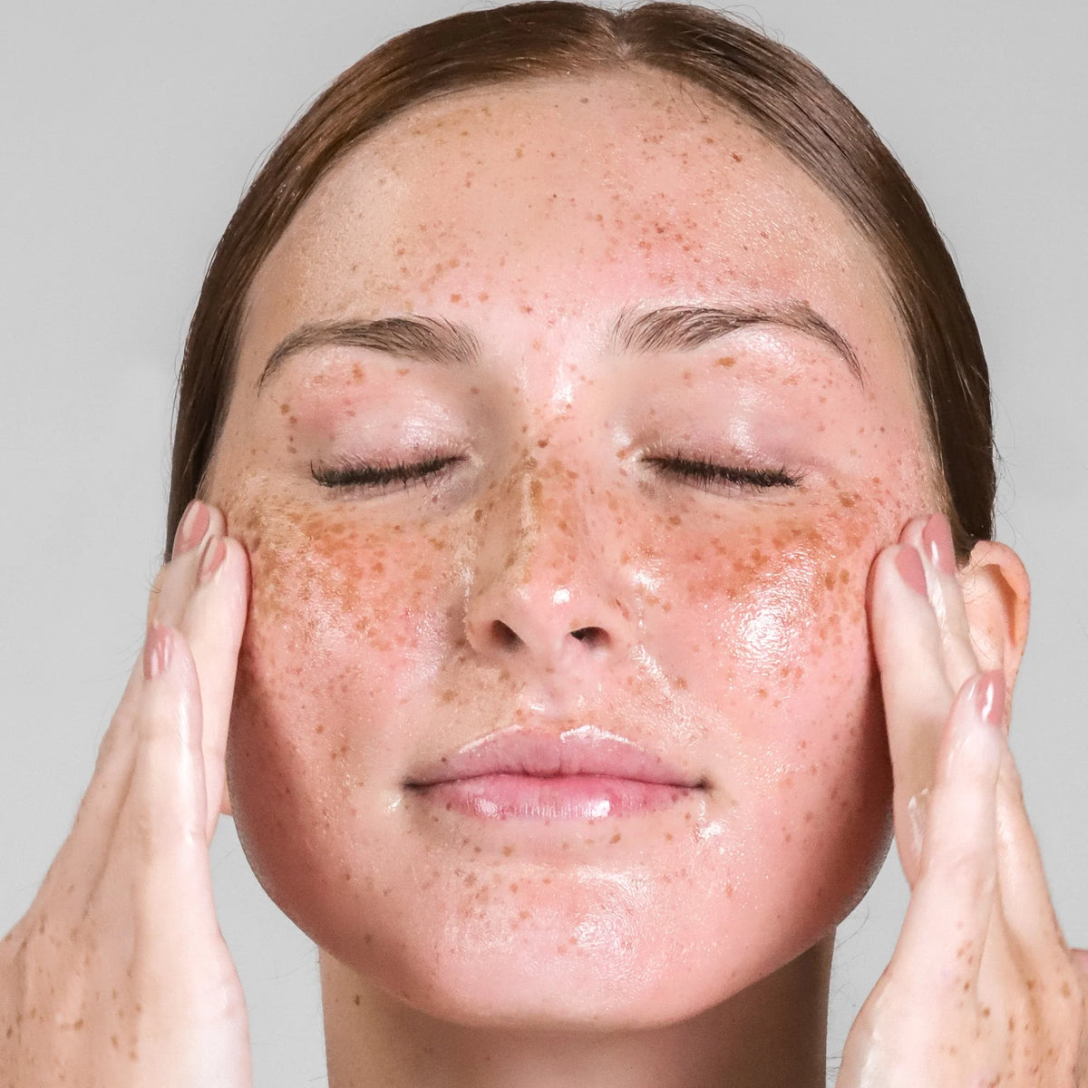 Cosmedix Purity Solution Nourishing Cleansing Oil massaged onto skin for gentle makeup removal and nourished radiant cleanse. 