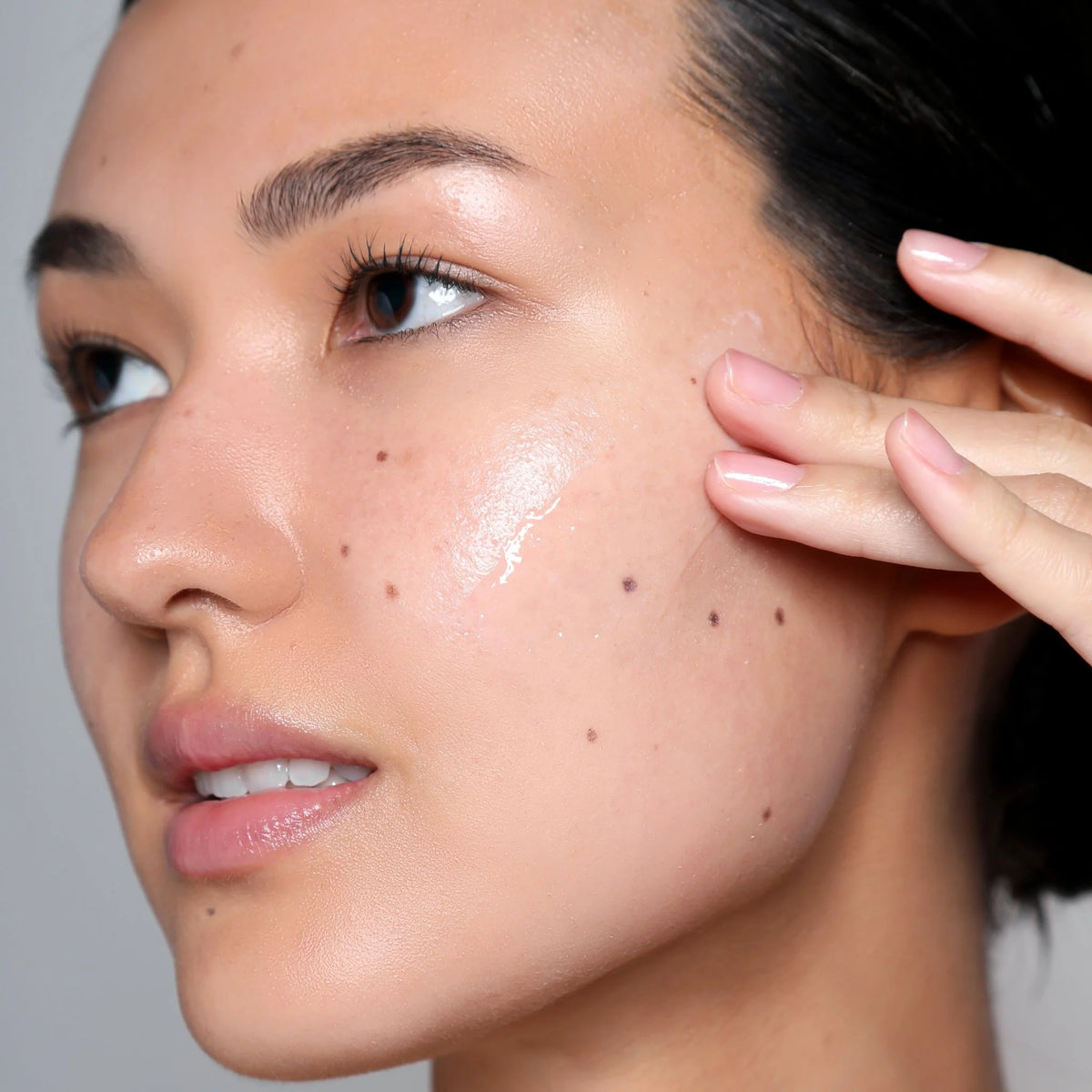 Cosmedix Reboot Overnight Hydration Complex applied to skin for overnight hydration and a dewy complexion.
