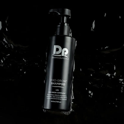 DP Dermaceuticals EXO-GROW Shampoo bottle floating in water, emphasising hydrating, follicle-supporting and growth-boosting haircare benefits.