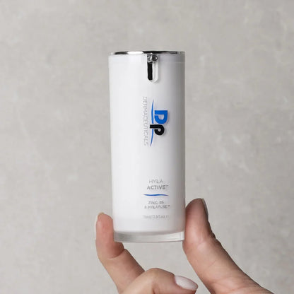 Dp Dermaceuticals Hyla Active 15ml held in hand, a professional hydration serum designed to calm visible redness and improve skin comfort.