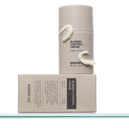 INSKIN.CO Blemish Control Cream styled next to box with cream smears showcasing acne treatment moisturiser texture and oil-balancing skincare.