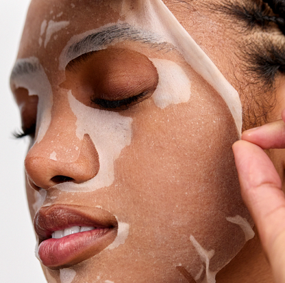Woman wearing INSKIN.CO Plump & Hydrate Daily Sheet Mask highlighting intense hydration and skin-plumping treatment.