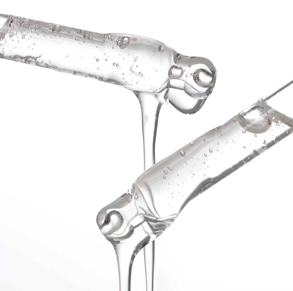 NSKIN.CO Multi-Active & BHA Serum texture close up with droppers filled with salicylic acid serum highlighting lightweight exfoliating consistency.