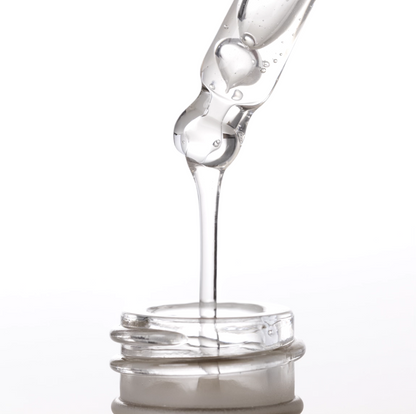 INSKIN.CO Vitamin D & B5 Serum texture close up with dropper dispensing lightweight hydrating serum back into bottle.