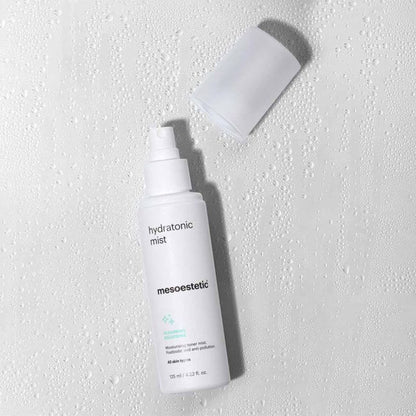 Mesoestetic Hydratonic Mist with cap removed, a hydrating post-cleansing toner mist for all skin types to support comfort and freshness.