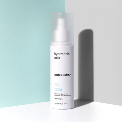Mesoestetic Hydratonic Mist hydrating toner mist shown in a styled setting, designed to rebalance and refresh all skin types after cleansing.