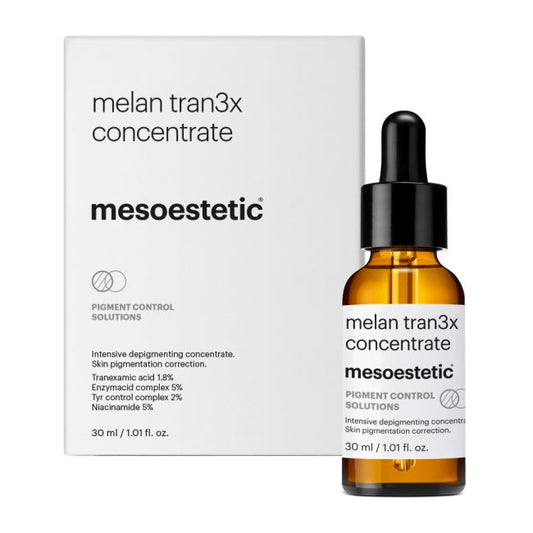 Mesoestetic Melan Tran3x Concentrate depigmenting serum with box, formulated to reduce dark spots and improve uneven skin tone.