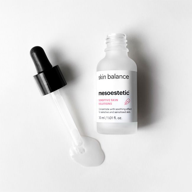 Mesoestetic Skin Balance open bottle and dropper, a soothing serum for reactive skin designed to calm irritation and support skin resilience.