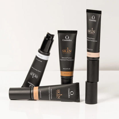 O Cosmedics 1SKIN Lotus Skin Primer alongside O Cosmedics 1SKIN Natural Fusion Treatment Foundation shades for even-looking, longer-lasting complexion makeup.