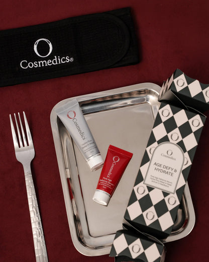 O Cosmedics Age Defy & Hydrate Bon-Bon with Hyaluronic Acid serum, nourishing sleep-in mask and festive gift packaging.
