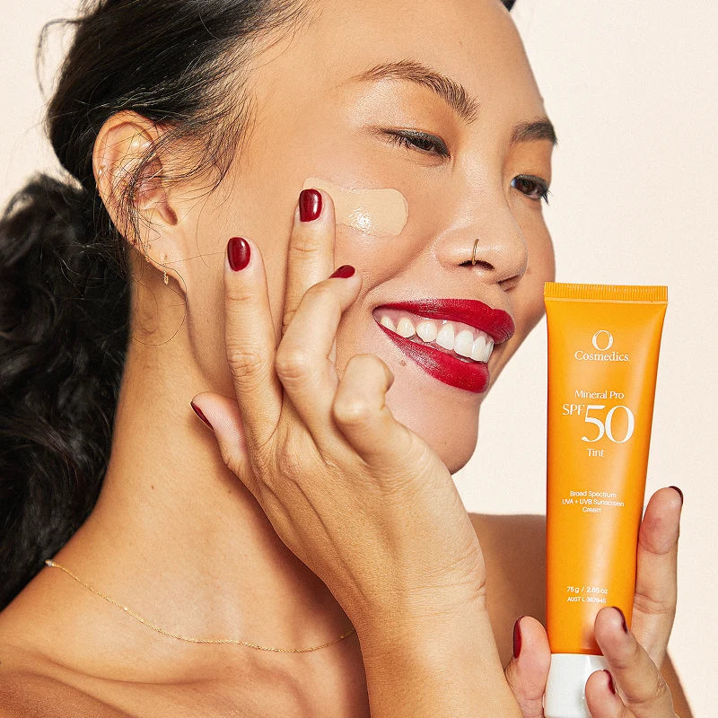 O Cosmedics Mineral Pro SPF 50 Tinted applied to skin for SPF 50 mineral protection and sheer tone correction.