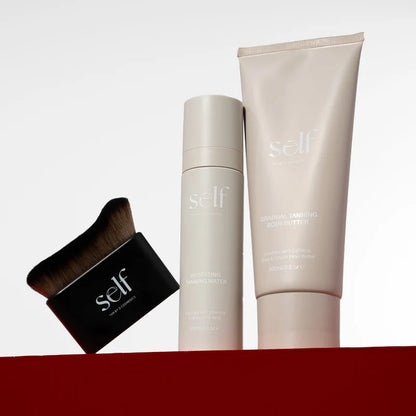 O Cosmedics SELF Glow Maintenance Kit for face and body, combining skincare-enriched tanning formulas with precision blending for a smooth, golden glow.