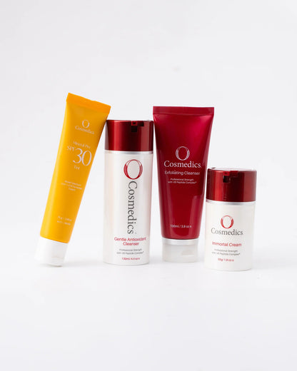 O Cosmedics The Core Four Collection Immortal skincare gift set with O Cosmedics Mineral Pro SPF 30 Tinted, O Cosmedics Immortal Cream, O Cosmedics Gentle Antioxidant Cleanser and O Cosmedics Exfoliating Cleanser for radiant, hydrated skin.