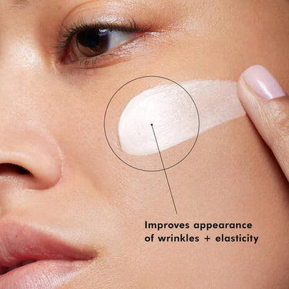 SkinCeuticals A.G.E. Interrupter Advanced shown on skin to improve the appearance of wrinkles and elasticity.