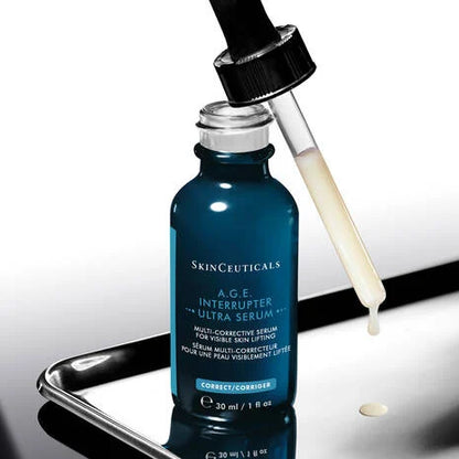 SkinCeuticals A.G.E. Interrupter Ultra Serum in dropper bottle, a lightweight firming serum for visible lifting and contour support.