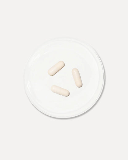 Vida Glow Advanced Repair Luminous capsules shown close-up to represent daily antioxidant support for brighter, more luminous skin.