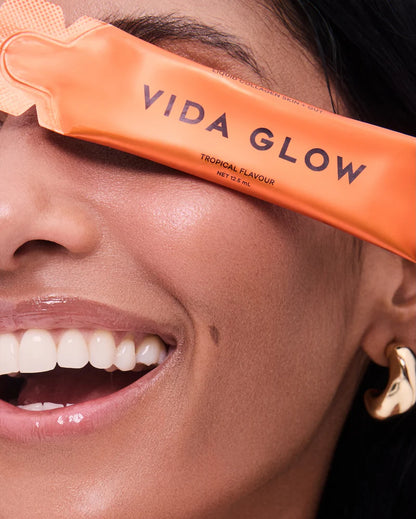 Vida Glow Liquid Collagen Skin + Gut Tropical beauty supplement supporting firmer-looking skin, hydration and digestive wellness.