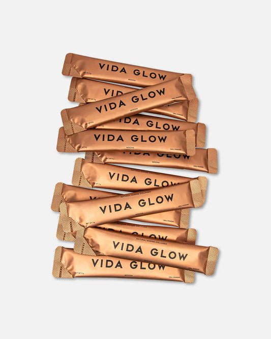 Vida Glow Natural Marine Collagen Mocha sachets arranged together, showcasing convenient daily marine collagen powder for skin, hair and nails.