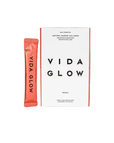 Vida Glow Natural Marine Collagen Peach marine collagen sachets with full-size box, peach-flavoured collagen supplement for skin firmness and glow.
