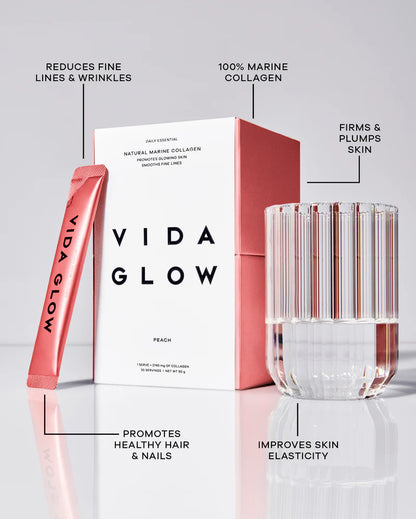 Vida Glow Natural Marine Collagen Peach collagen powder styled with glass, highlighting skin elasticity, glowing skin and daily marine collagen benefits.