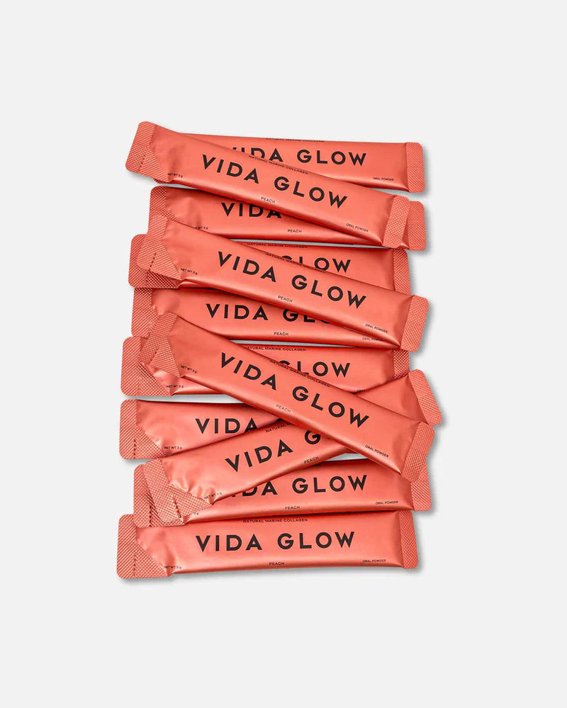 Vida Glow Natural Marine Collagen Peach sachets, daily marine collagen supplement for glowing skin, skin elasticity and beauty from within.