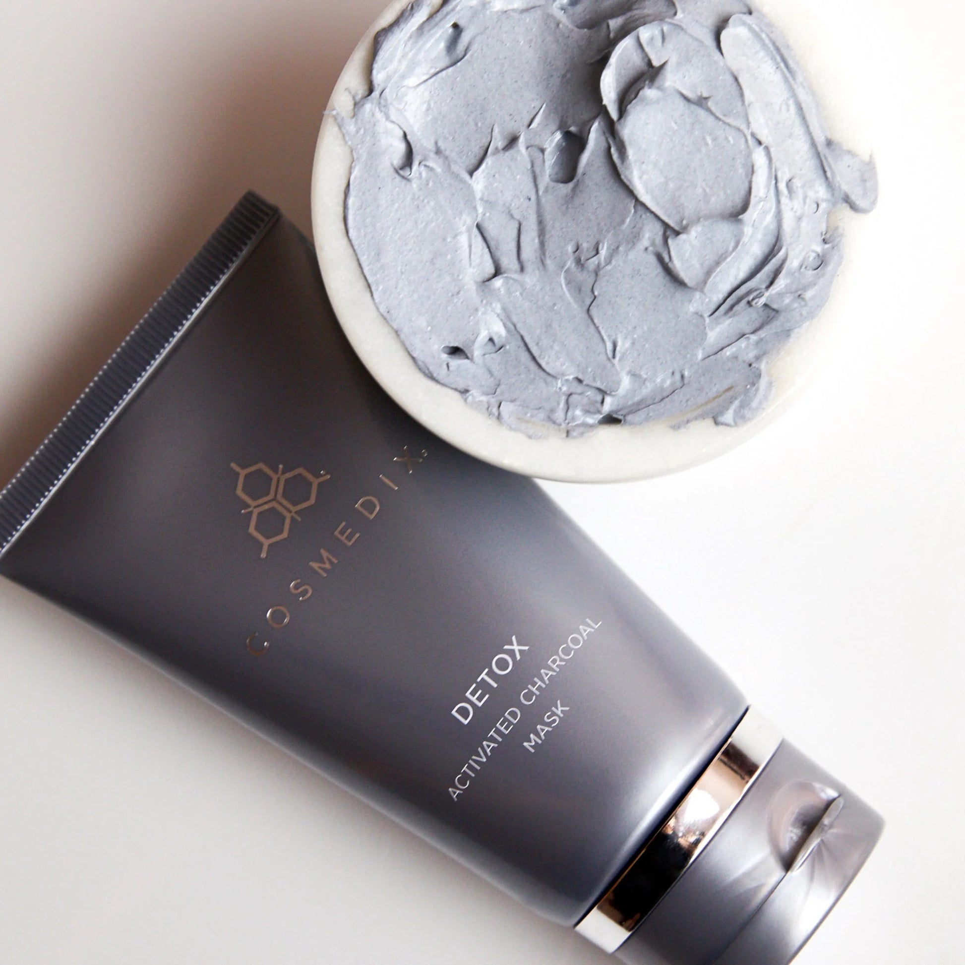 Cosmedix Detox Activated Charcoal Mask gentle clarifying treatment for smoother, purified skin.